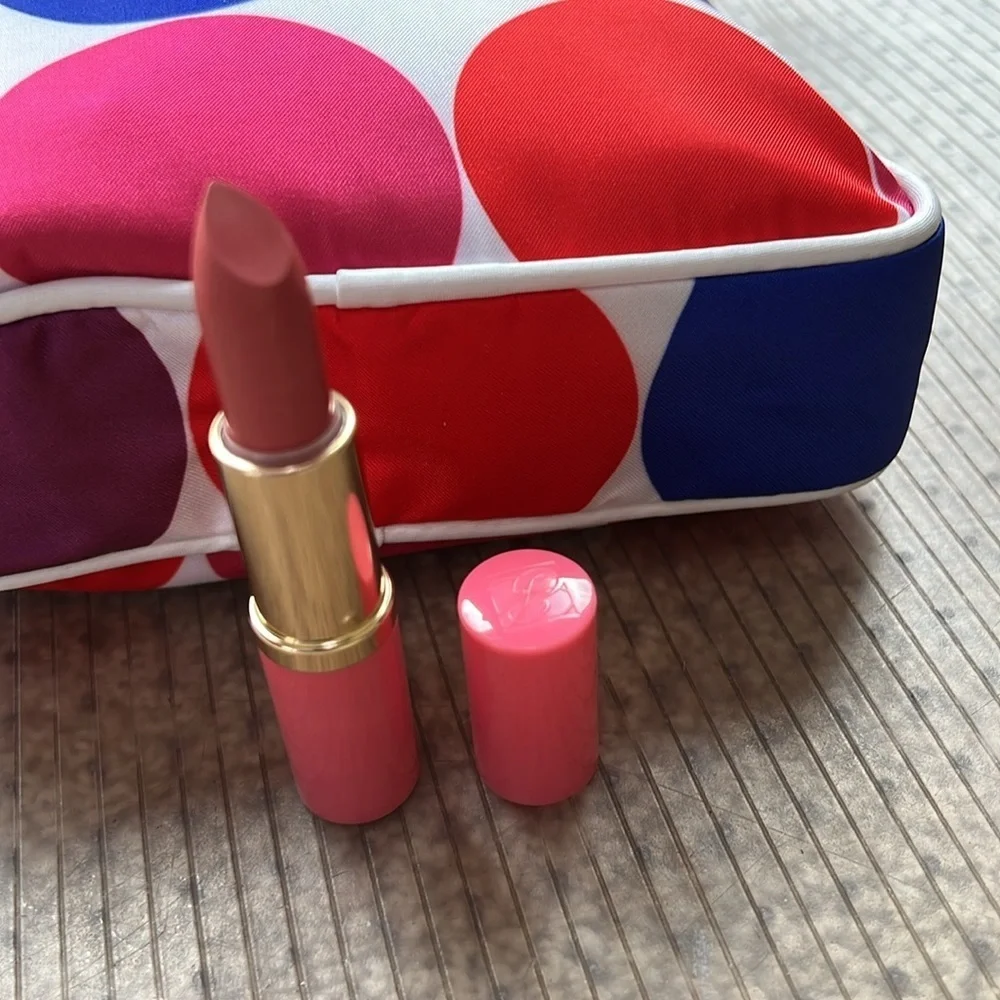 Estée Lauder candy shimmer long lasting lipstick.
